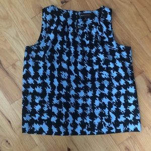 Blue sleeveless blouse with buckle detail. Size XL